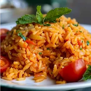 Close-up of authentic Turkish bulgur wheat pilaf recipe garnished with herbs and tomatoes